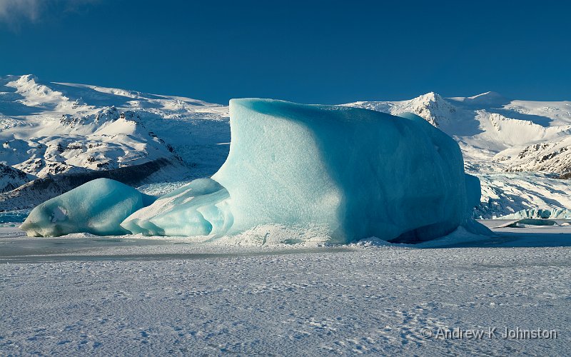 240214_G9ii_1002656.jpg - Large iceberg on the frozen lake at Fjallasarlon